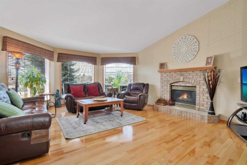 7 Revie Close, Red Deer, AB - Indoor Photo Showing Living Room With Fireplace
