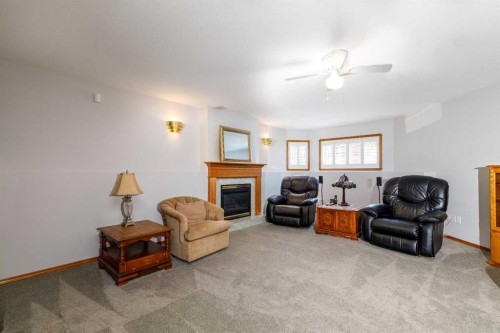 145 Doran Crescent, Red Deer, AB - Indoor Photo Showing Living Room With Fireplace