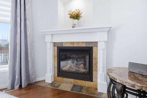 91 Woodrow Close, Red Deer, AB - Indoor Photo Showing Living Room With Fireplace