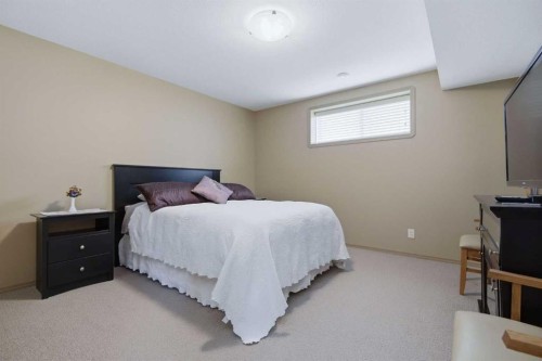 91 Woodrow Close, Red Deer, AB - Indoor Photo Showing Bedroom