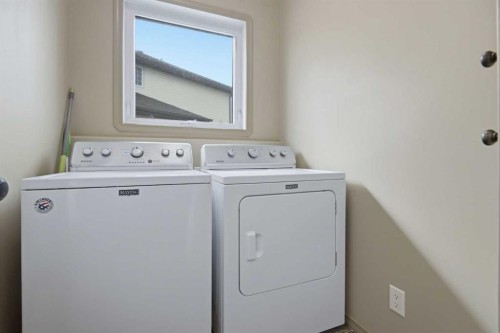 91 Woodrow Close, Red Deer, AB - Indoor Photo Showing Laundry Room