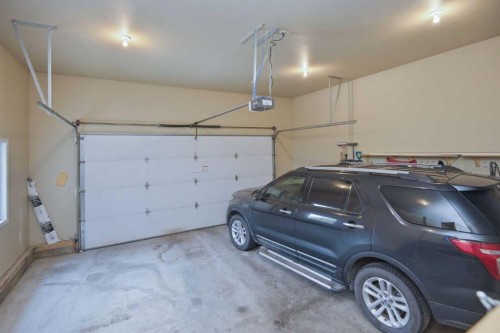 91 Woodrow Close, Red Deer, AB - Indoor Photo Showing Garage