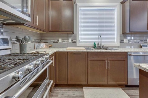 30 Tagish Avenue, Red Deer, AB - Indoor Photo Showing Kitchen With Upgraded Kitchen