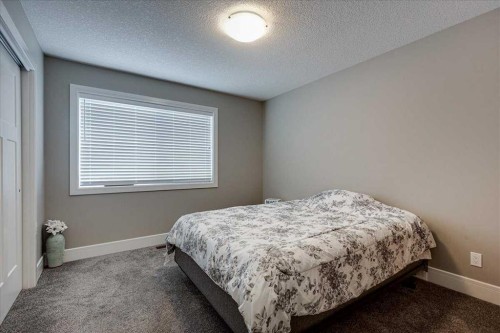 30 Tagish Avenue, Red Deer, AB - Indoor Photo Showing Bedroom