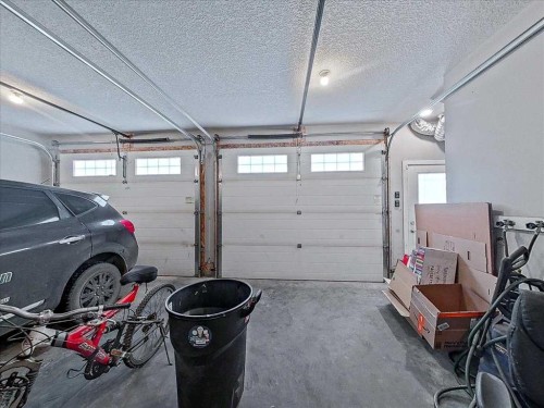 30 Tagish Avenue, Red Deer, AB - Indoor Photo Showing Garage
