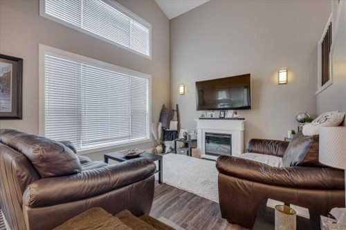 30 Tagish Avenue, Red Deer, AB - Indoor Photo Showing Living Room With Fireplace