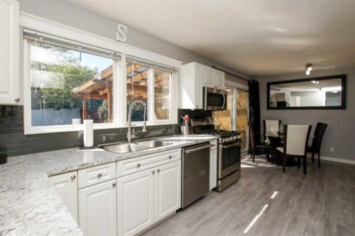 4 Mckee Close, Red Deer, AB - Indoor Photo Showing Kitchen With Double Sink
