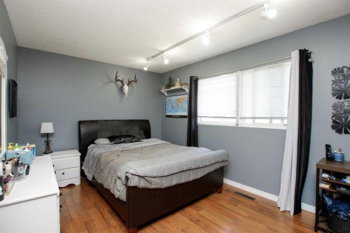 4 Mckee Close, Red Deer, AB - Indoor Photo Showing Bedroom