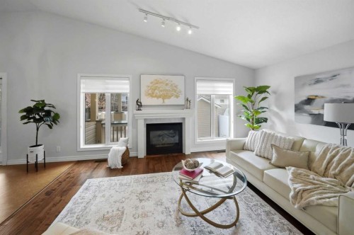 4 Drever Close, Red Deer, AB - Indoor Photo Showing Living Room With Fireplace