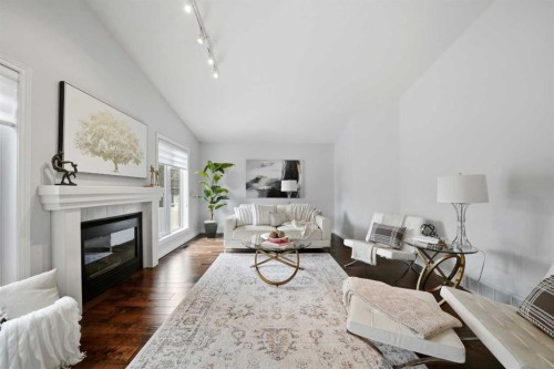 4 Drever Close, Red Deer, AB - Indoor Photo Showing Living Room With Fireplace