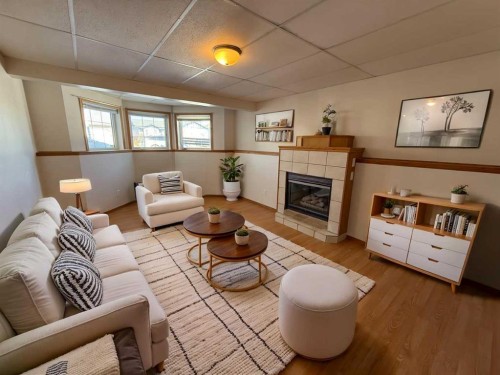 5905 61 Ave, Ponoka, AB - Indoor Photo Showing Living Room With Fireplace