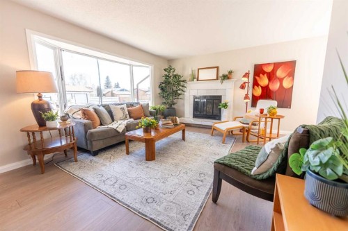 4 Barrett Drive, Red Deer, AB - Indoor Photo Showing Living Room With Fireplace