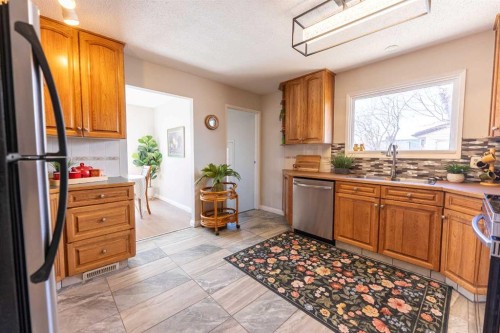 4 Barrett Drive, Red Deer, AB - Indoor Photo Showing Kitchen With Double Sink