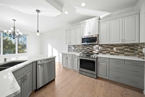 116 Allwright Close, Red Deer, AB - Indoor Photo Showing Kitchen With Double Sink With Upgraded Kitchen
