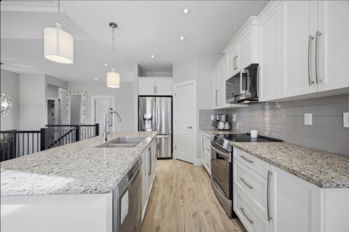 2 Vernon Close, Red Deer, AB - Indoor Photo Showing Kitchen With Stainless Steel Kitchen With Double Sink With Upgraded Kitchen