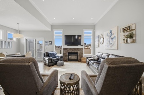 2 Vernon Close, Red Deer, AB - Indoor Photo Showing Living Room With Fireplace