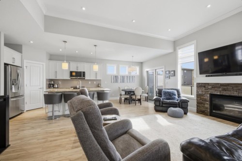 2 Vernon Close, Red Deer, AB - Indoor Photo Showing Living Room With Fireplace