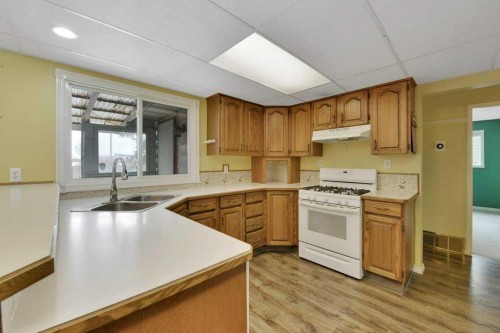 37 Wilson Crescent, Red Deer, AB - Indoor Photo Showing Kitchen With Double Sink