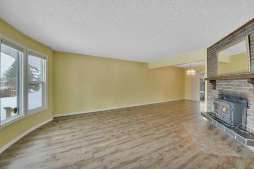 37 Wilson Crescent, Red Deer, AB - Indoor With Fireplace