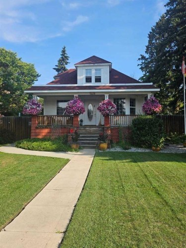 5406 50 Avenue, Lacombe, AB - Outdoor With Deck Patio Veranda