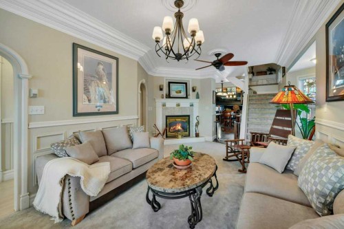 5406 50 Avenue, Lacombe, AB - Indoor Photo Showing Living Room With Fireplace