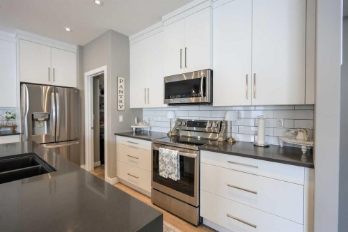 5 Trebble Close, Red Deer, AB - Indoor Photo Showing Kitchen With Stainless Steel Kitchen With Double Sink With Upgraded Kitchen