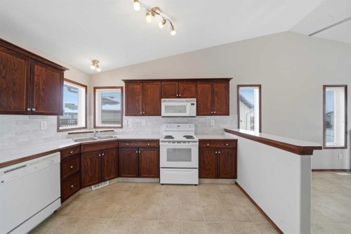 159 Lanterman Close, Red Deer, AB - Indoor Photo Showing Kitchen With Double Sink