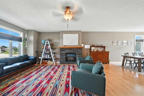 6511 57 Street, Olds, AB - Indoor Photo Showing Living Room With Fireplace