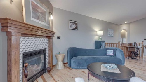 33 Parkside Crescent, Blackfalds, AB - Indoor Photo Showing Living Room With Fireplace