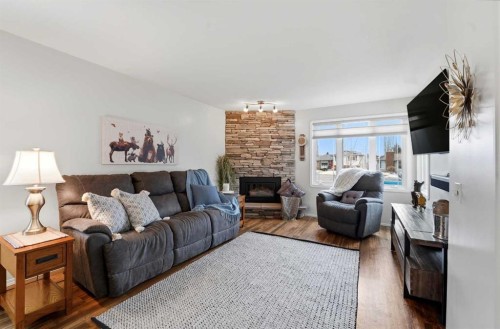 40 Connell Close, Red Deer, AB - Indoor Photo Showing Living Room With Fireplace