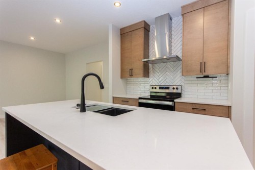 165 Thompson Crescent, Red Deer, AB - Indoor Photo Showing Kitchen With Upgraded Kitchen