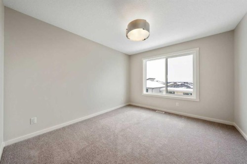 374 Heritage Boulevard, Cochrane, AB - Indoor Photo Showing Other Room