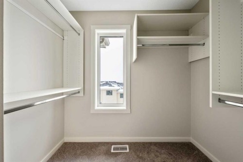 374 Heritage Boulevard, Cochrane, AB - Indoor With Storage