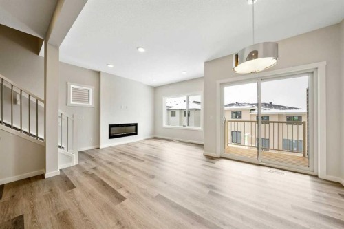 374 Heritage Boulevard, Cochrane, AB - Indoor With Fireplace