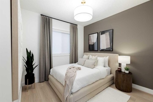 192 Amblestone Crescent Nw, Calgary, AB - Indoor Photo Showing Bedroom