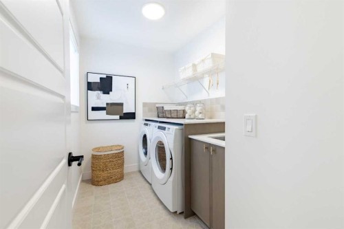 192 Amblestone Crescent Nw, Calgary, AB - Indoor Photo Showing Laundry Room