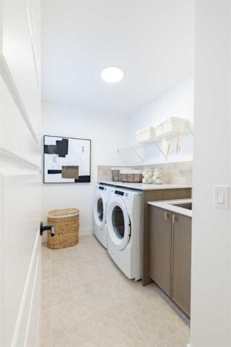 192 Amblestone Crescent Nw, Calgary, AB - Indoor Photo Showing Laundry Room