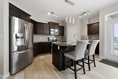 77 Tanner Street, Red Deer, AB - Indoor Photo Showing Kitchen With Upgraded Kitchen