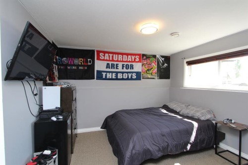 26 Wilkinson Circle, Sylvan Lake, AB - Indoor Photo Showing Bedroom
