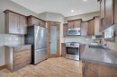 16 Richfield Crescent, Sylvan Lake, AB  - Indoor Photo Showing Kitchen With Double Sink 