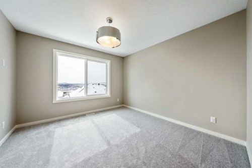 370 Heritage Boulevard, Cochrane, AB - Indoor Photo Showing Other Room
