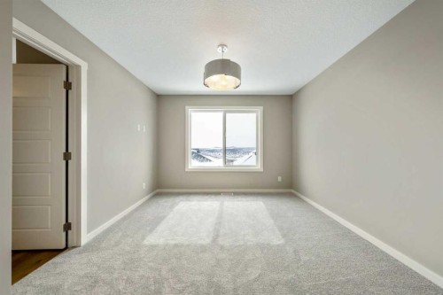 370 Heritage Boulevard, Cochrane, AB - Indoor Photo Showing Other Room