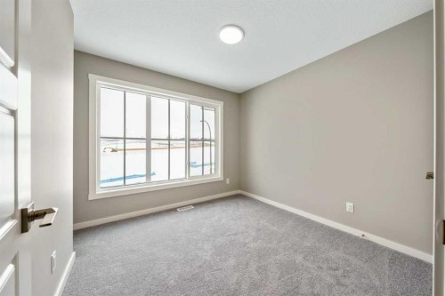 370 Heritage Boulevard, Cochrane, AB - Indoor Photo Showing Other Room