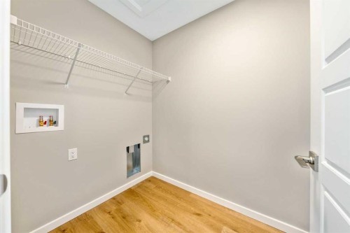 370 Heritage Boulevard, Cochrane, AB - Indoor With Storage