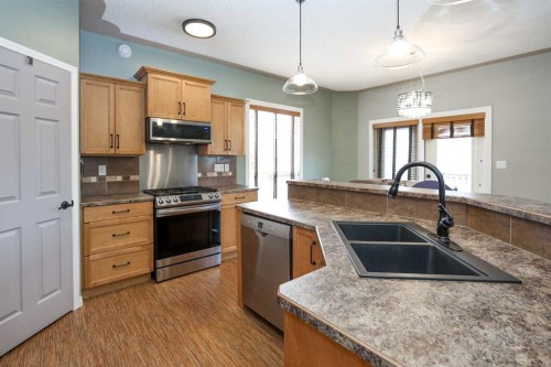 98 Pine Crescent, Blackfalds, AB - Indoor Photo Showing Kitchen With Stainless Steel Kitchen With Double Sink