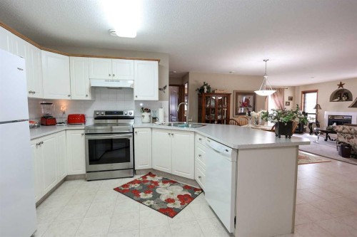 22D-32 Daines Avenue, Red Deer, AB - Indoor Photo Showing Kitchen With Double Sink