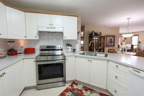 22D-32 Daines Avenue, Red Deer, AB - Indoor Photo Showing Kitchen With Double Sink