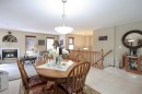 22D-32 Daines Avenue, Red Deer, AB  - Indoor Photo Showing Dining Room With Fireplace 