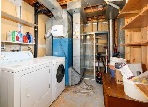 32 Greig Drive, Red Deer, AB - Indoor Photo Showing Laundry Room