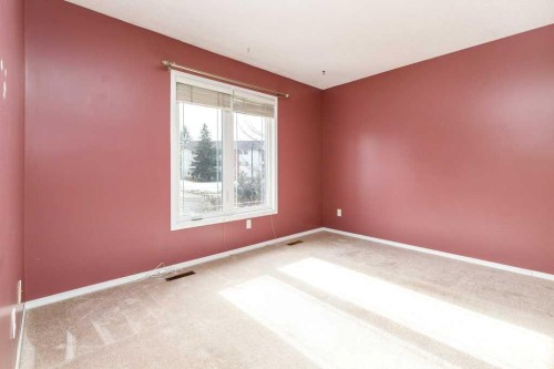 32 Greig Drive, Red Deer, AB - Indoor Photo Showing Kitchen With Double Sink